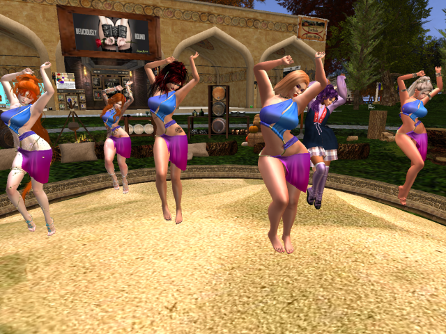 Girls dancing in the sandpit at the GU with me in the background